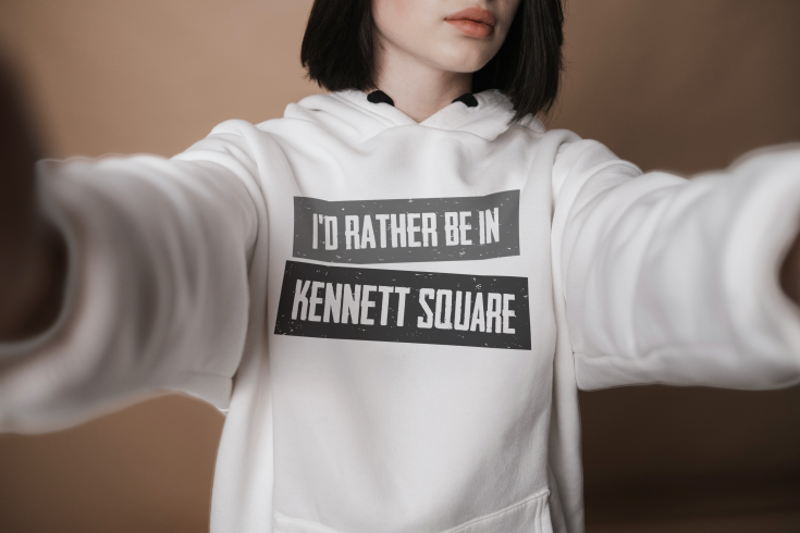 woman wearing Kennett Square hoodie