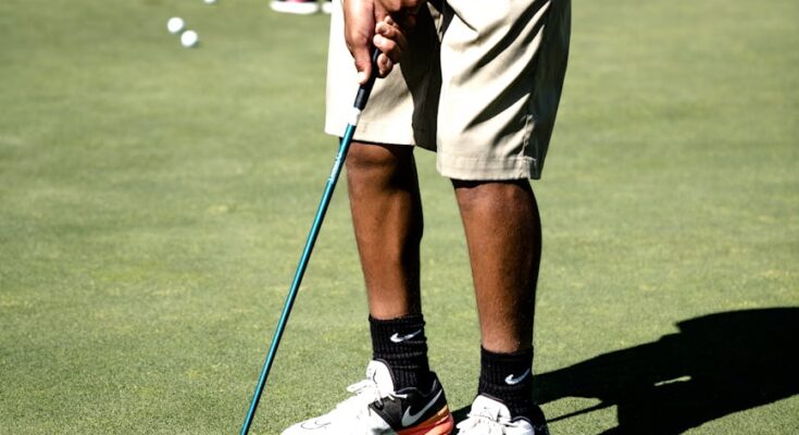 Person playing golf