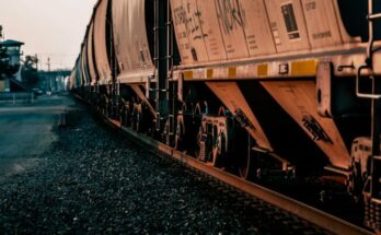 Freight train on empty railway station