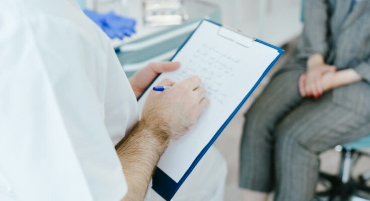 Doctor talking to the patient