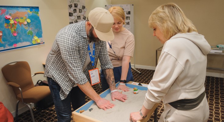 Project participants going through a group exercise in Ukraine