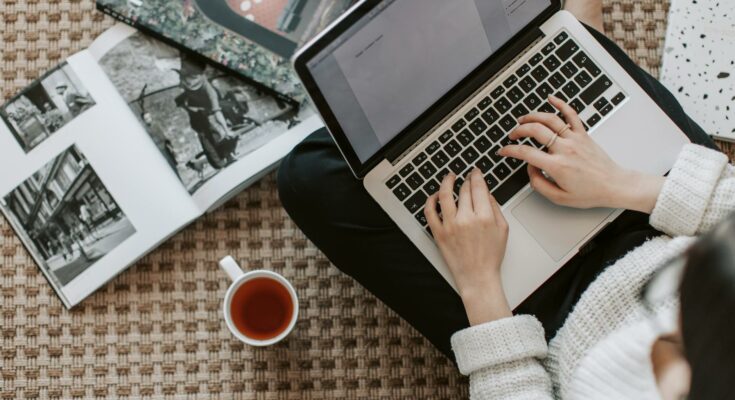 Young businesswoman using laptop