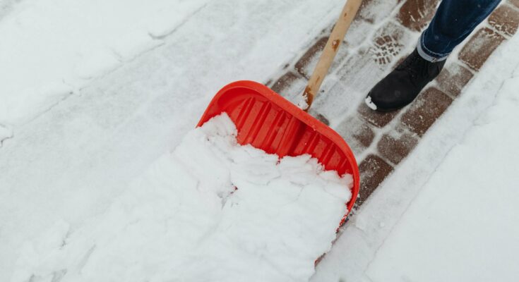 Man plowing the driveway
