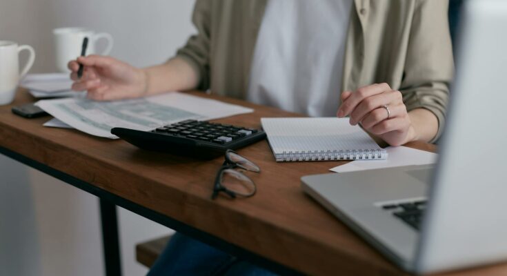 Woman paying bills