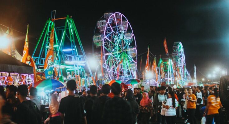 Group of people gather at fair