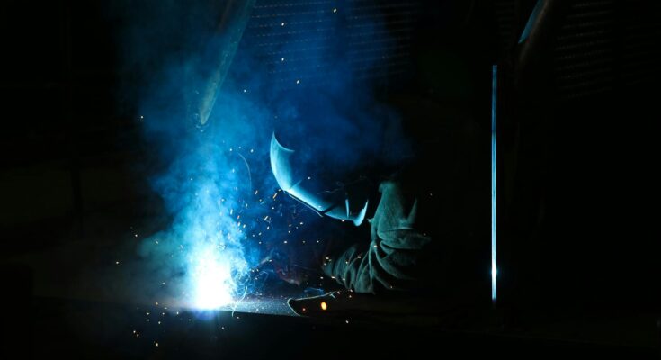 Man using a electric welder