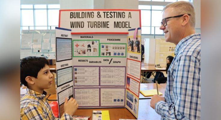 A student at the Salk Fair