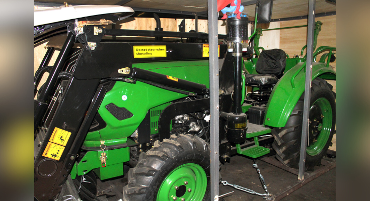 Noncompliant wheeled backhoe tractor