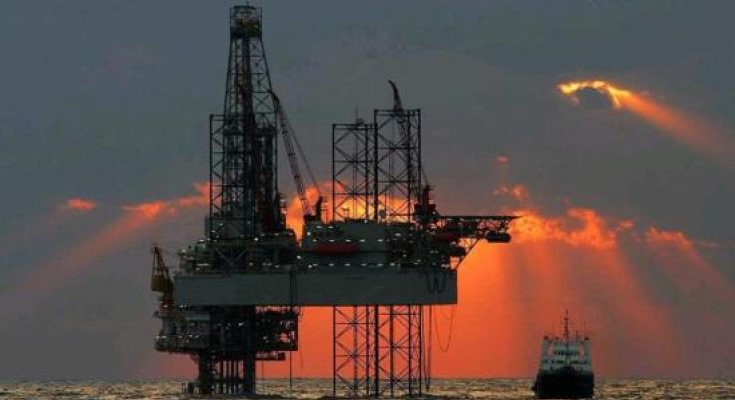 Oil rig at sunrise