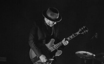 Man playing guitar on stage