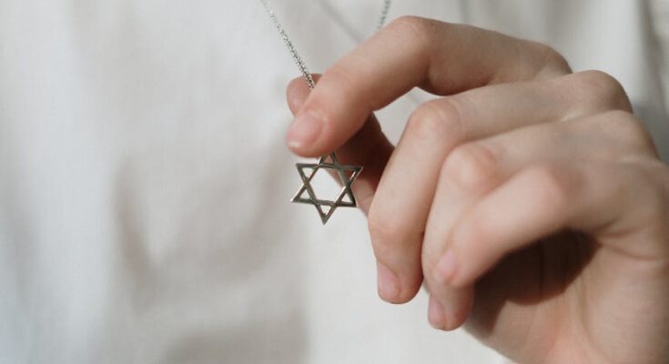 Person holding a star of david