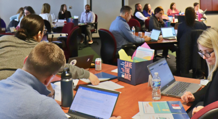 School administrators review the OAR Peer Awareness Kits.