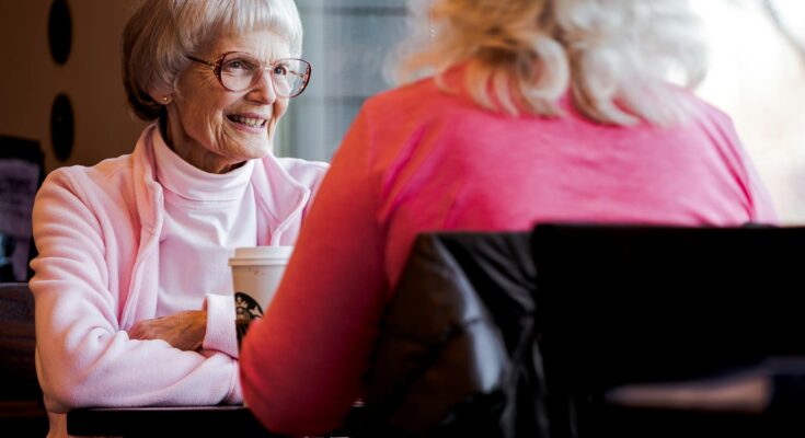 Old woman sitting while talking