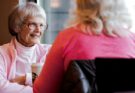 Old woman sitting while talking