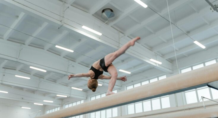 Person balancing on balance beam