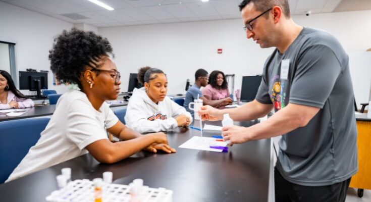 This summer, Dr. Brandon Mitchell (right), professor of physics and engineering at West Chester University, worked on campus with students associated with the Young Men and Women In Charge Foundation (YMWIC). (Photo provided by West Chester University.)