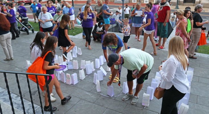 Setting up memorial luminaries - Night of Light 2024