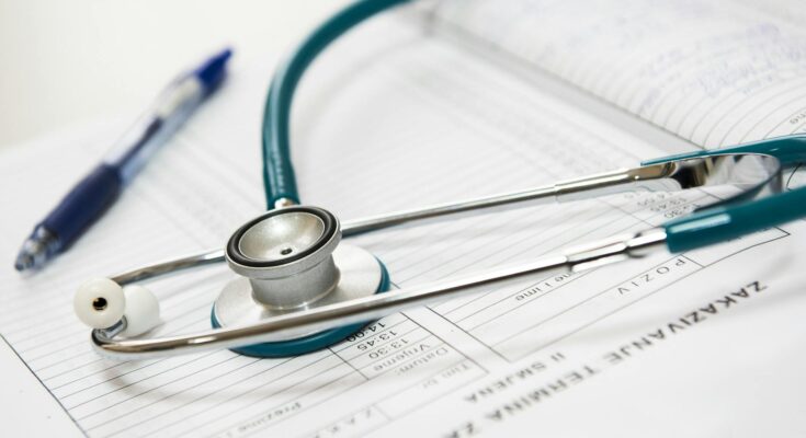 Medical records and stethoscope