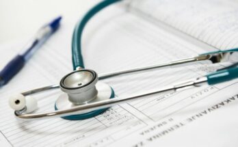 Medical records and stethoscope