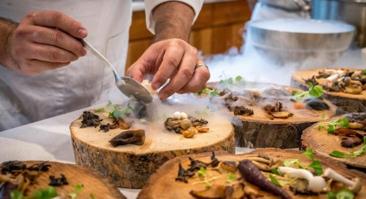 Chef preparing vegetable dish on tree slab