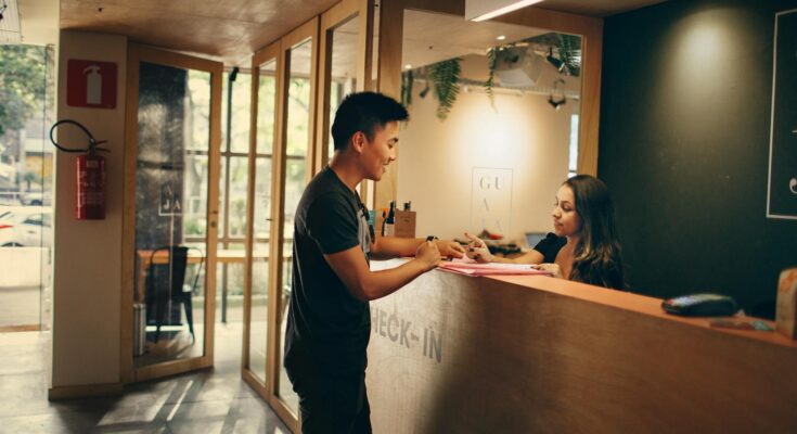 Man standing in front of front desk