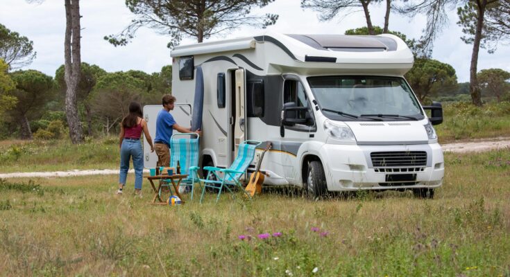 Couple on vacation with rv
