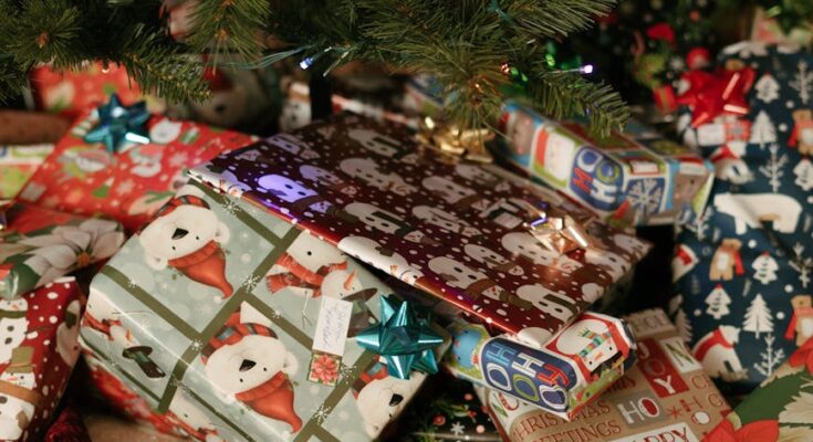 Festive christmas tree with wrapped gifts beneath