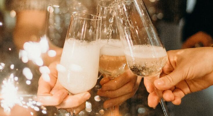 Person pouring champagne