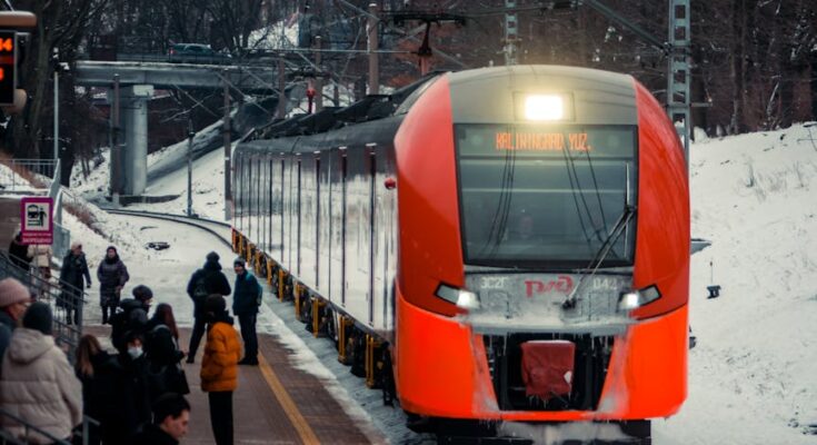 People standing on train station during winter
