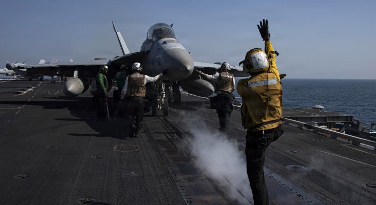An EA-18G Growler prepares to launch from the flight deck of the aircraft carrier USS Abraham Lincoln in support of Operation Epic Fury in the U.S. Central Command area of responsibility.