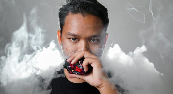smoke around man face