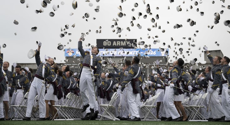 Newly commissioned Army officers toss their covers at the conclusion of the U.S. Military Academy graduation ceremony