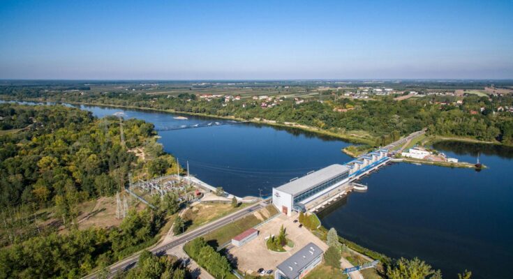 aerial view of river dam and surrounding landscape