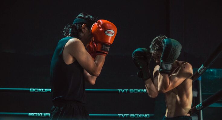 intense boxing match in ring