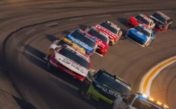Race cars speeding around a sharp turn on a track