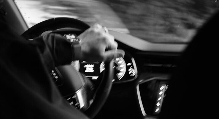 Someone drives a car at night