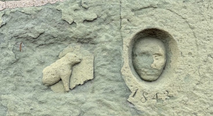 Inn Carving of Henry Clay and Lincoln the Dog