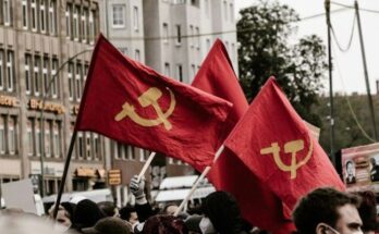 people holding Soviet flags