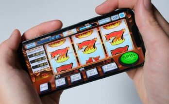 Someone is playing a mobile slot machine game