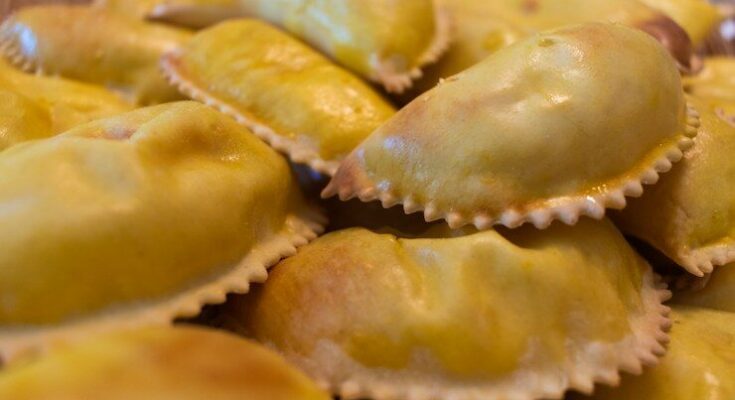 Pile of pierogies with crimped edges