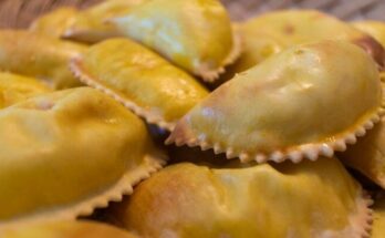Pile of pierogies with crimped edges